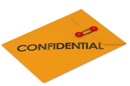 An envelope labelled confidential on top | DSV Direct Blog